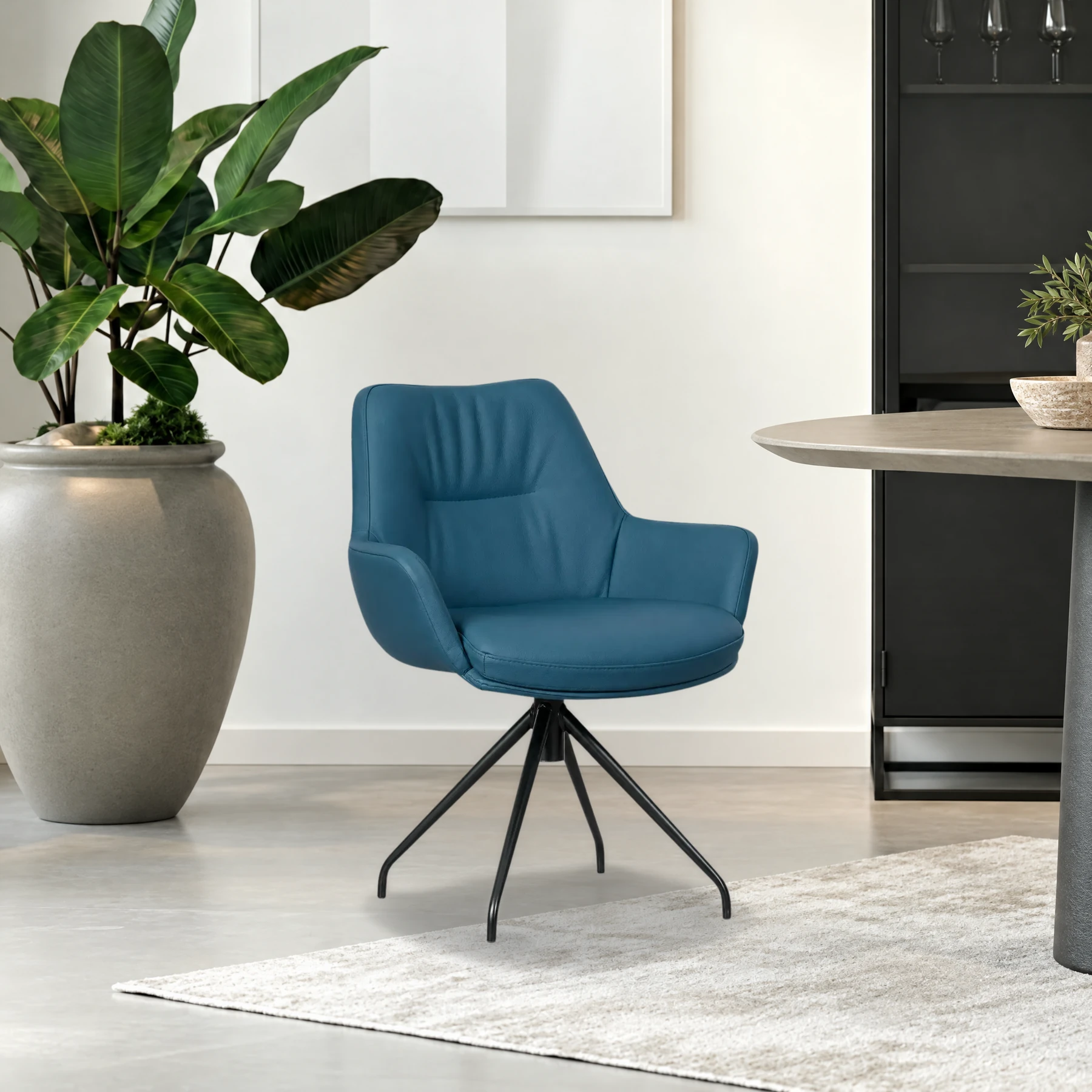 afbeelding van Leren draaibare eetkamerstoel Twist - Toledo Turquoise (blauw) - poten staal rond zwart